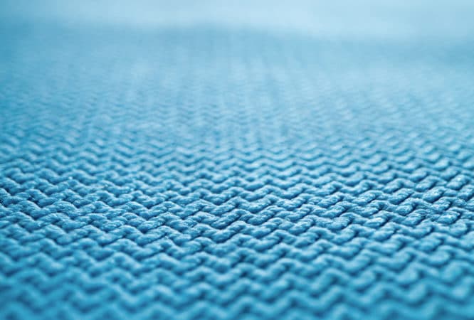 A close up view of The Simple Scrub's softest light blue microfiber cloth for polishing.